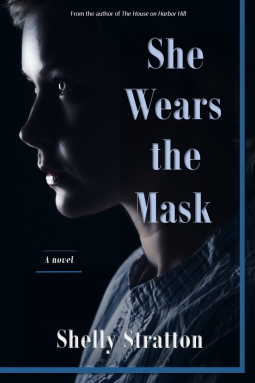 book cover for She Wears the Mask
