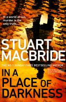 book cover for In a Place of Darkness