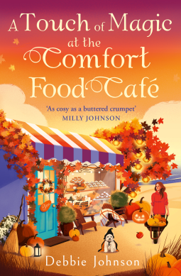 book cover for A Touch of Magic at the Comfort Food Café
