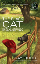 book cover for The Black Cat Knocks on Wood