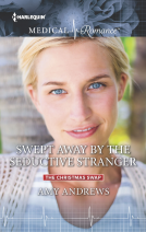 book cover for Swept Away by the Seductive Stranger